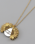 Bring a smile with this symbolic sunflower necklace.