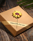 Bring a smile with this symbolic sunflower necklace.