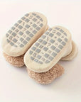 Anti-slip baby booties for newborn girls and boys with a cute bear design - Angelie