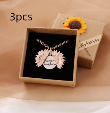 Bring a smile with this symbolic sunflower necklace.