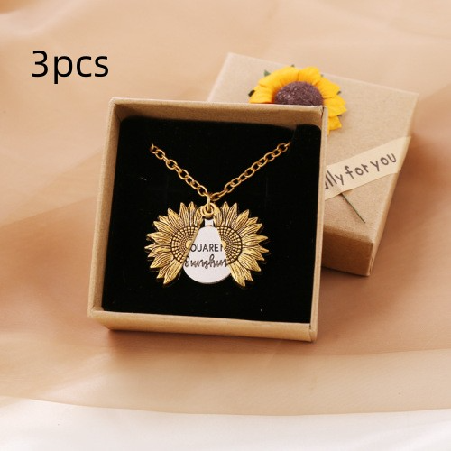 Bring a smile with this symbolic sunflower necklace.