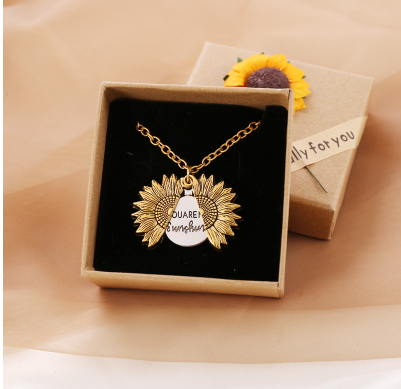 Bring a smile with this symbolic sunflower necklace.