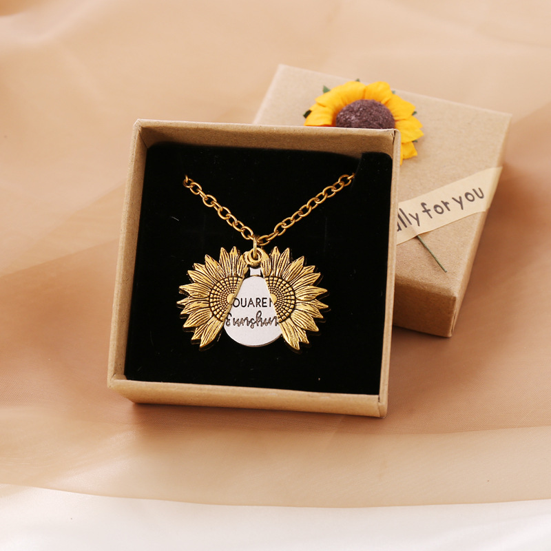 Bring a smile with this symbolic sunflower necklace.
