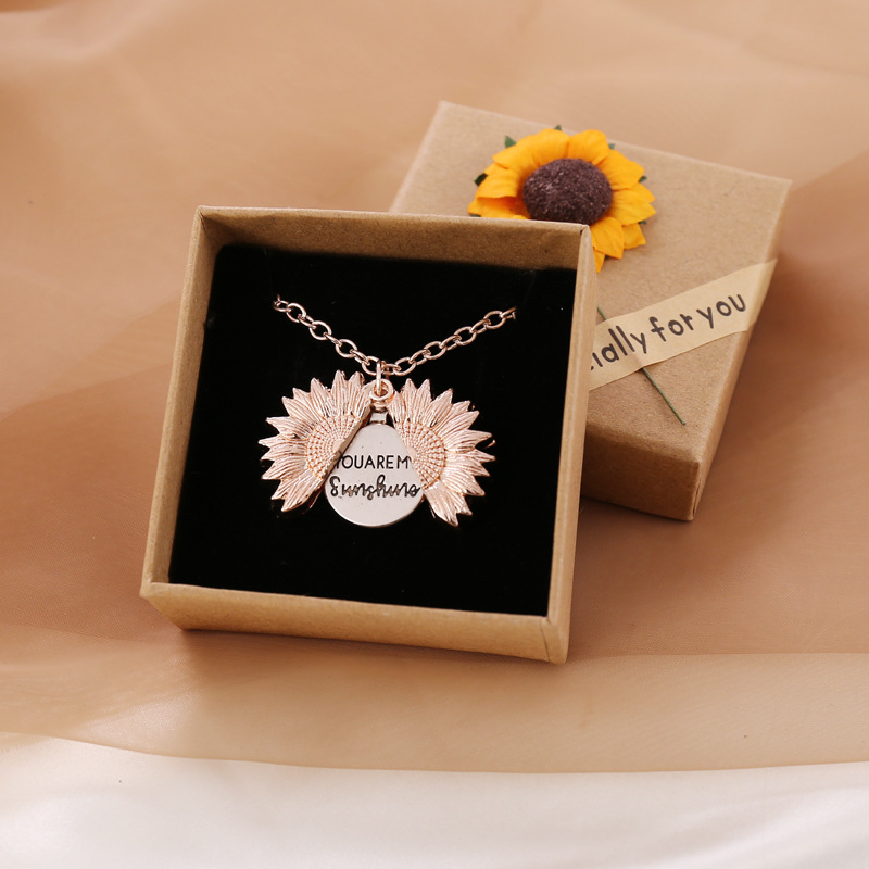 Bring a smile with this symbolic sunflower necklace.