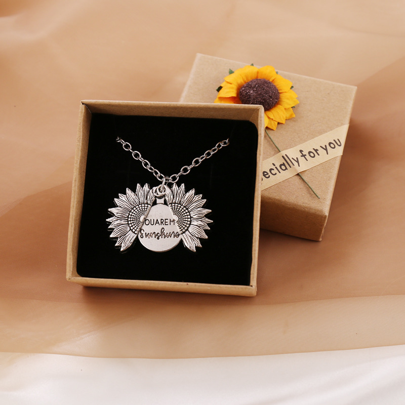 Bring a smile with this symbolic sunflower necklace.