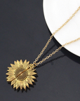 Bring a smile with this symbolic sunflower necklace.