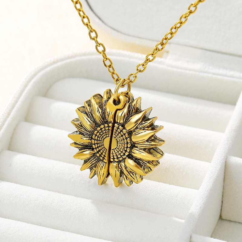 Bring a smile with this symbolic sunflower necklace.