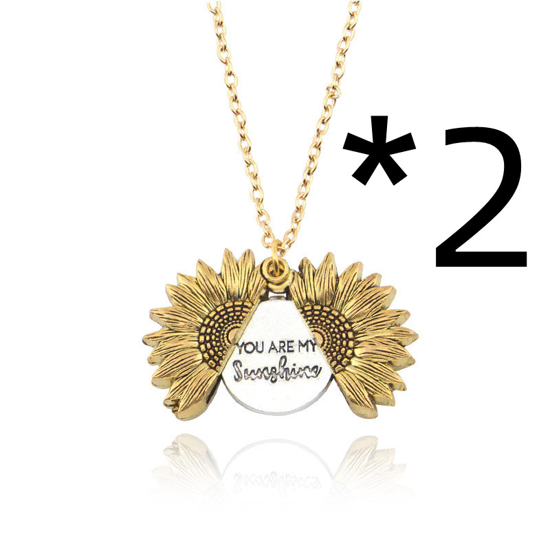 Bring a smile with this symbolic sunflower necklace.
