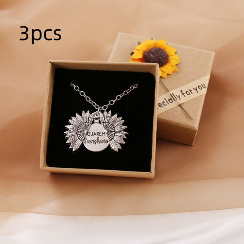 Bring a smile with this symbolic sunflower necklace.