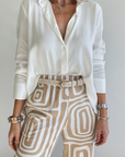 Clio – Stylish 2-Piece Women's Outfit with White Blouse and Geometric Trousers