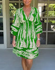 Dress with V-neck and three-quarter sleeves