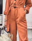 Elegant Orange Jumpsuit with Flattering Fit and Feminine Flair