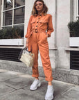 Elegant Orange Jumpsuit with Flattering Fit and Feminine Flair