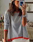 Elegant knitted women's sweater with loose stripes - Angelien