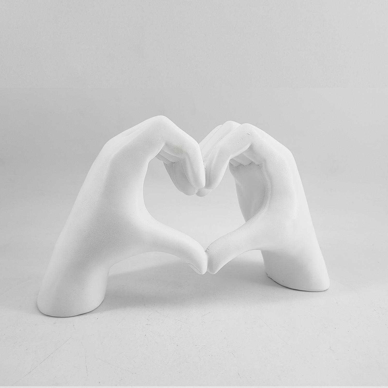 LoveSculpt – Modern Wooden Hands Heart Statue